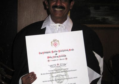 Dr. Naram with Certificate of Knighthood